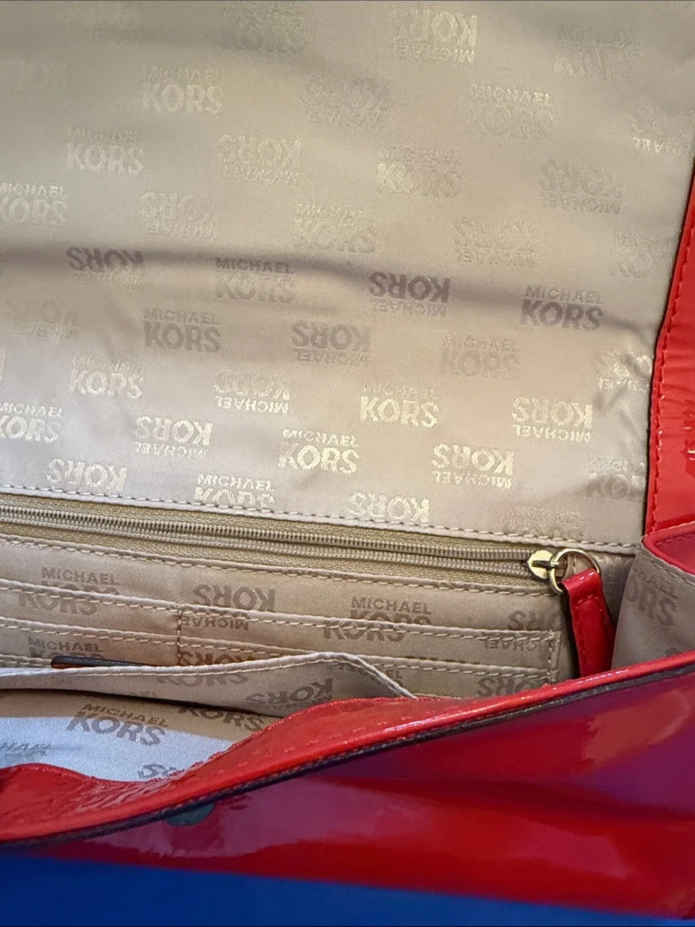 Michael Kors Glossy Orange Patent Leather Clutch with Gold Buckle